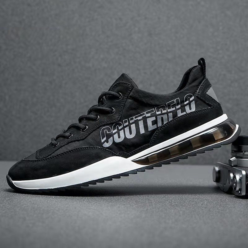 N007-Negro es una zapatilla deportiva perfecta para todos los niveles de entrenamiento. Cuenta con una cámara de aire para una amortiguación óptima y reducir el impacto en las articulaciones, especialmente en las rodillas, reduciendo el riesgo de lesiones. Está fabricada con un recubrimiento de lona y cuero sintético para ser resistente, transpirable y absorbente al sudor, y una suela dentada para obtener la mejor tracción. Cordones de ajuste para mayor ajuste.